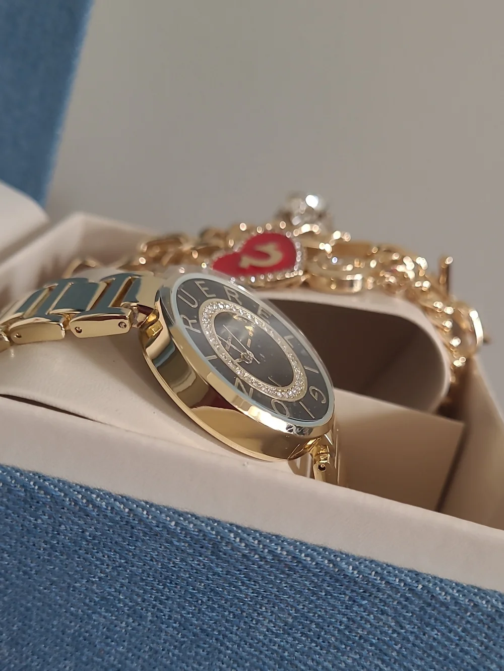 True Religion Gold-Tone Watch with Black Dial and Charm Bracelet